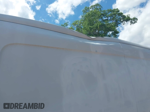2015 Ford Transit Cargo with VIN 1FTNE2CMXFKA90627, listed as a IAAI auction lot 40601859 with 230,893 mi miles. Bid and sale history available at carsss.com. Image 6.