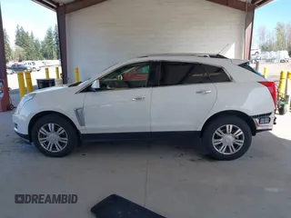 2015 Cadillac SRX Luxury Collection with VIN 3GYFNEE35FS573256, listed as a IAAI auction lot 41965935 with 79,207 mi miles. Bid and sale history available at carsss.com. Image 14.