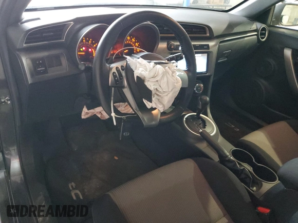 2016 Scion tC z VIN JTKJF5C75GJ022789, wystawiony jako Copart lot #54305435 z przebiegiem 49 007 mil mil oraz Szkody całkowita. Historia ofert i sprzedaży dostępna na DreamBid. Obrazek 8.