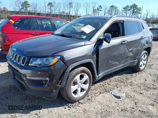 2018 Jeep Compass Altitude with VIN 3C4NJDBBXJT202826, listed as a IAAI auction lot 42012645 with 125,839 mi miles and . Bid and sale history available at carsss.com. Image 18.