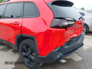 2018 Jeep Cherokee Limited z VIN 1C4PJMDB4JD602540, wystawiony jako IAAI lot #42100732 z przebiegiem 84 567 mil mil oraz . Historia ofert i sprzedaży dostępna na DreamBid. Obrazek 12.