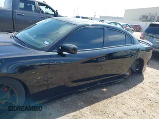 2019 Dodge Charger R/T with VIN 2C3CDXCT2KH575297, listed as a IAAI auction lot 41661339 with 119,854 mi miles and . Bid and sale history available at DreamBid. Image 6.