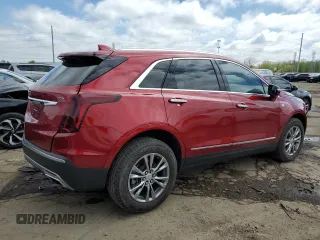 2023 Cadillac XT5 FWD Premium Luxury z VIN 1GYKNCRS5PZ173528, wystawiony jako Copart lot #55805605 z przebiegiem 7 789 mil mil oraz Szkoda całkowita • Salvage title. Historia ofert i sprzedaży dostępna na DreamBid. Obrazek 3.