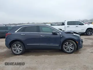 2024 Cadillac XT5 FWD Premium Luxury with VIN 1GYKNCR47RZ755652, listed as a IAAI auction lot 41512069 with 10,243 mi miles. Bid and sale history available at carsss.com. Image 13.