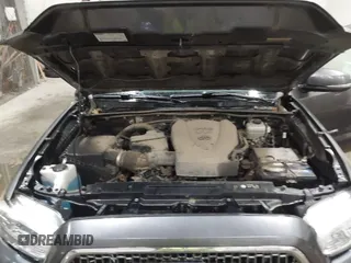 2017 Toyota Tacoma SR5 with VIN 3TMDZ5BN8HM016825, listed as a IAAI auction lot 41658400 with 166,098 mi miles. Bid and sale history available at carsss.com. Image 10.