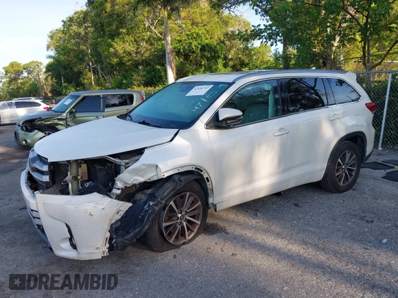 2018 Toyota Highlander SE with VIN 5TDKZRFH6JS534716, listed as a IAAI auction lot 42554743 with 154,636 mi miles and . Bid and sale history available at DreamBid. Image 2.