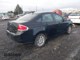 2010 Ford Focus SE with VIN 1FAHP3FN1AW108974, listed as a IAAI auction lot 41208950 with 146,536 mi miles. Bid and sale history available at carsss.com. Image 4.