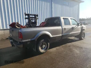 2004 Ford F-350 XL z VIN 1FTSW31P74EB59689, wystawiony jako Copart lot #87101184 z przebiegiem 240 134 mil mil oraz Szkoda całkowita • Salvage title. Historia ofert i sprzedaży dostępna na DreamBid. Obrazek 3.