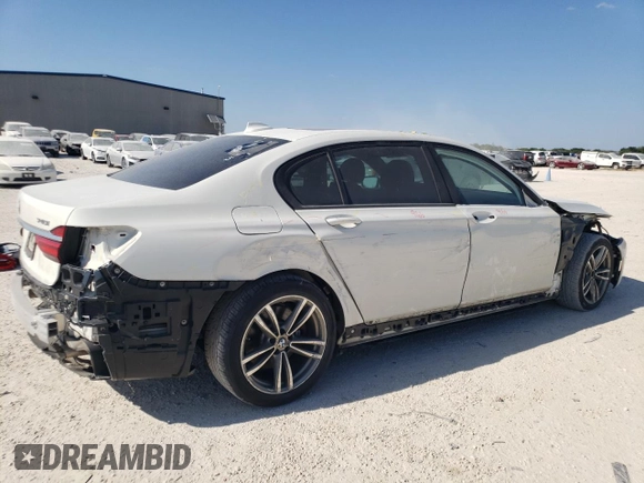 2018 BMW 7 Series 740i with VIN WBA7E2C58JG741652, listed as a Copart auction lot 57802073 with 79,441 mi miles. Bid and sale history available at carsss.com. Image 3.