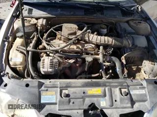 2000 Chevrolet Cavalier LS z VIN 1G1JF5246Y7310844, wystawiony jako Copart lot #70492794 z przebiegiem Nie podano mil oraz Szkoda całkowita • Salvage title. Historia ofert i sprzedaży dostępna na DreamBid. Obrazek 11.