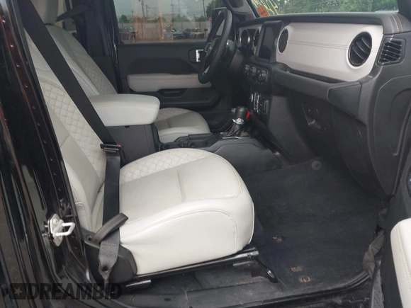 2023 Jeep Gladiator Overland with VIN 1C6JJTFM9PL593659, listed as a IAAI auction lot 42470253 with 34,374 mi miles and . Bid and sale history available at DreamBid. Image 5.