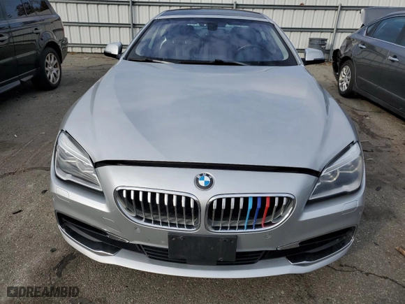 2016 BMW 6 Series 650i xDrive with VIN WBA6D6C52GG387898, listed as a Copart auction lot 77109254 with 106,134 mi miles and Salvage Title. Bid and sale history available at carsss.com. Image 5.