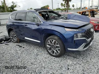 2021 Hyundai Santa Fe Calligraphy z VIN 5NMS5DAL1MH371927, wystawiony jako Copart lot #62935825 z przebiegiem 36 605 mil mil oraz Nie do naprawy • Non repairable. Historia ofert i sprzedaży dostępna na DreamBid. Obrazek 4.