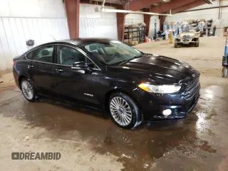 2014 Ford Fusion Titanium Hybrid z VIN 3FA6P0RUXER168706, wystawiony jako Copart lot #55362295 z przebiegiem 136 382 mil mil oraz Czysty tytuł • Clean title. Historia ofert i sprzedaży dostępna na DreamBid. Obrazek 4.