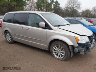 2015 Dodge Grand Caravan SXT with VIN 2C4RDGCG5FR640149, listed as a IAAI auction lot 41480020 with 141,524 mi miles. Bid and sale history available at carsss.com. Image 1.