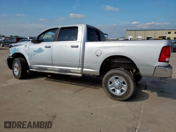 2014 Ram 2500 SLT with VIN 3C6TR5DT2EG205852, listed as a Copart auction lot 59514745 with 130,510 mi miles and Salvage title. Bid and sale history available at DreamBid. Image 2.