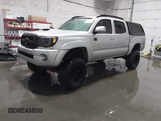 2011 Toyota Tacoma with VIN 3TMLU4EN9BM070836, listed as a IAAI auction lot 41668595 with 89,879 mi miles and . Bid and sale history available at DreamBid. Image 2.