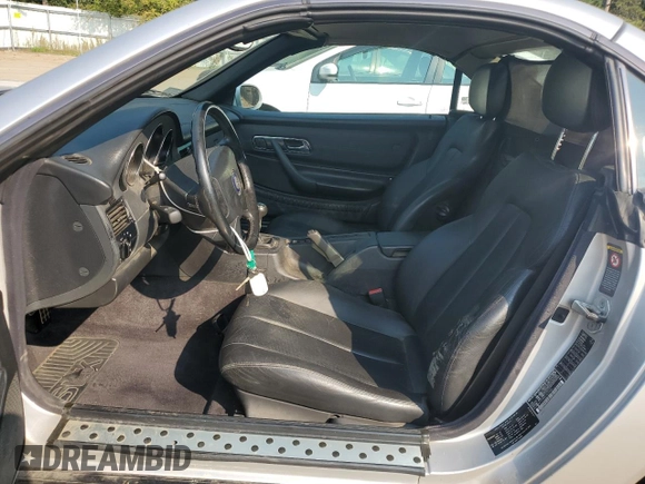 1999 Mercedes-Benz SLK-Class with VIN WDBKK47F9XF127582, listed as a Copart auction lot 71345494 with 187,302 mi miles and Salvage Title. Bid and sale history available at carsss.com. Image 7.