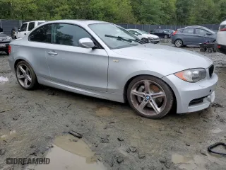 2011 BMW 1 Series 135i with VIN WBAUC9C56BVM09045, listed as a Copart auction lot 73316874 with 125,679 mi miles and Salvage Title. Bid and sale history available at carsss.com. Image 4.
