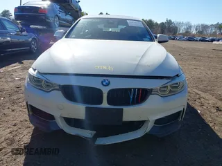 2015 BMW 4 Series 428i xDrive with VIN WBA4C9C51FD331298, listed as a IAAI auction lot 41892173 with 120,484 mi miles and . Bid and sale history available at DreamBid. Image 12.