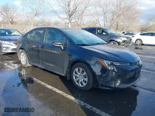 2022 Toyota Corolla LE with VIN JTDEPMAE3NJ194494, listed as a IAAI auction lot 41210879 with 56,266 mi miles. Bid and sale history available at carsss.com. Image 1.