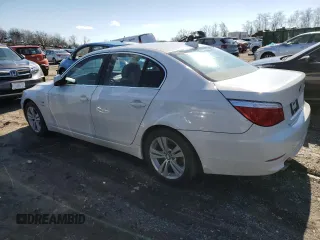 2010 BMW 5 Series 528i xDrive with VIN WBANV1C58AC388869, listed as a Copart auction lot 45670775 with 220,938 mi miles and Salvage Title. Bid and sale history available at carsss.com. Image 2.