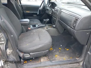 2003 Jeep Grand Cherokee Laredo with VIN 1J4GW48S83C553535, listed as a IAAI auction lot 42387097 with 360,465 mi miles and . Bid and sale history available at DreamBid. Image 5.