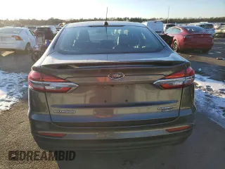 2020 Ford Fusion Plug-In Hybrid Titanium with VIN 3FA6P0SUXLR158328, listed as a Copart auction lot 42090075 with 49,788 mi miles and Salvage Title. Bid and sale history available at carsss.com. Image 6.