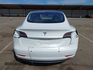 2018 Tesla Model 3 Long Range Battery with VIN 5YJ3E1EA2JF023370, listed as a IAAI auction lot 42008406 with 163,474 mi miles and . Bid and sale history available at DreamBid. Image 17.