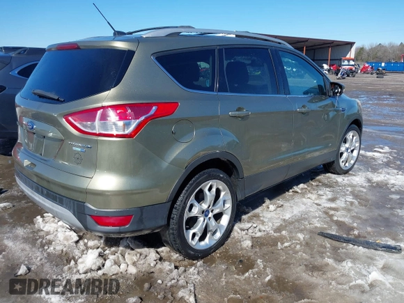 2013 Ford Escape Titanium with VIN 1FMCU9J99DUD46870, listed as a IAAI auction lot 41614409 with 141,739 mi miles and . Bid and sale history available at DreamBid. Image 4.