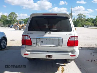 2003 Lexus LX 470 with VIN JTJHT00WX33523623, listed as a IAAI auction lot 42028889 with 317,700 mi miles and . Bid and sale history available at DreamBid. Image 16.
