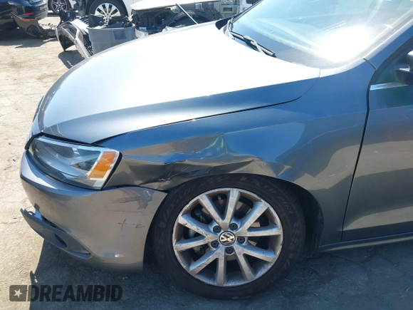 2013 Volkswagen Jetta SE with VIN 3VWDP7AJ8DM436818, listed as a IAAI auction lot 42386196 with 121,043 mi miles and . Bid and sale history available at DreamBid. Image 6.