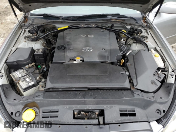 2002 Infiniti Q45 z VIN JNKBF01A52M002920, wystawiony jako Copart lot #73249364 z przebiegiem 95 955 mil mil oraz Tytuł czysty. Historia ofert i sprzedaży dostępna na DreamBid. Obrazek 11.
