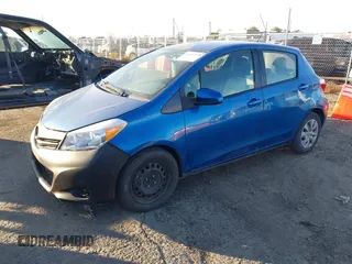 2012 Toyota Yaris L with VIN JTDKTUD38CD541628, listed as a IAAI auction lot 41335728 with 146,132 mi miles. Bid and sale history available at carsss.com. Image 2.