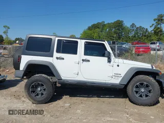 2015 Jeep Wrangler Unlimited Willys Wheeler with VIN 1C4BJWDG0FL546000, listed as a IAAI auction lot 41984566 with 112,742 mi miles and . Bid and sale history available at DreamBid. Image 13.