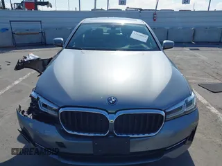 2023 BMW 5 Series 530e z VIN WBA13AG00PCM10164, wystawiony jako IAAI lot #42406603 z przebiegiem 26 770 mil mil oraz . Historia ofert i sprzedaży dostępna na DreamBid. Obrazek 12.