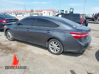 2014 Toyota Avalon Limited with VIN 4T1BK1EB3EU087911, listed as a IAAI auction lot 42070580 with 191,687 mi miles. Bid and sale history available at carsss.com. Image 3.