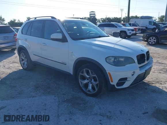 2011 BMW X5 35i with VIN 5UXZV4C52BL410497, listed as a IAAI auction lot 41995459 with 162,781 mi miles. Bid and sale history available at carsss.com. Image 1.