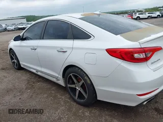 2015 Hyundai Sonata Sport with VIN 5NPE34AF9FH110094, listed as a IAAI auction lot 42142628 with 77,603 mi miles and . Bid and sale history available at DreamBid. Image 14.