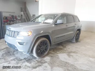2022 Jeep Grand Cherokee WK Laredo X with VIN 1C4RJFAG8NC112280, listed as a IAAI auction lot 41590680 with 62,072 mi miles. Bid and sale history available at carsss.com. Image 21.