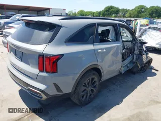 2022 Kia Sorento SX z VIN 5XYRK4LFXNG120480, wystawiony jako IAAI lot #41992301 z przebiegiem 33 551 mil mil oraz . Historia ofert i sprzedaży dostępna na DreamBid. Obrazek 4.