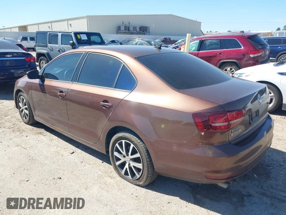 2016 Volkswagen Jetta Sedan 1.4T SE with VIN 3VWD67AJ2GM340416, listed as a IAAI auction lot 41663211 with 157,283 mi miles. Bid and sale history available at carsss.com. Image 3.
