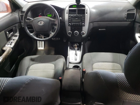 2007 Kia Spectra with VIN KNAFE161775008415, listed as a Copart auction lot 76591404 with 221,117 mi miles and Clean Title. Bid and sale history available at carsss.com. Image 8.