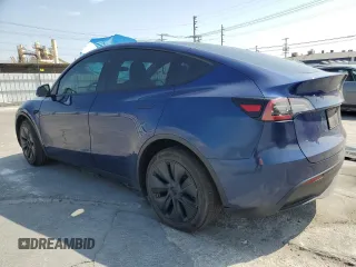 2024 Tesla Model Y with VIN 7SAYGDED0RF102479, listed as a Copart auction lot 55431975 with 23,989 mi miles and Salvage title. Bid and sale history available at DreamBid. Image 2.