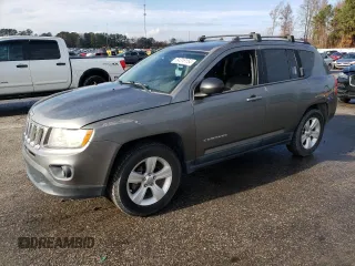 2011 Jeep Compass with VIN 1J4NT1FA7BD231941, listed as a Copart auction lot 84316154 with 158,617 mi miles and Clean Title. Bid and sale history available at carsss.com. Image 1.