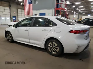 2021 Toyota Corolla Hybrid LE with VIN JTDEAMDE4MJ002382, listed as a Copart auction lot 50318865 with 74,385 mi miles and Salvage Title. Bid and sale history available at carsss.com. Image 2.