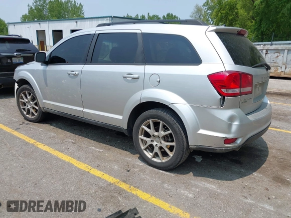 2012 Dodge Journey SXT with VIN 3C4PDDBG1CT249368, listed as a IAAI auction lot 42412217 with 151,680 mi miles and . Bid and sale history available at DreamBid. Image 3.