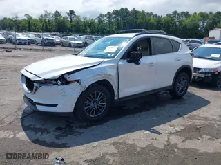 2019 Mazda CX-5 Touring with VIN JM3KFBCM3K0659167, listed as a IAAI auction lot 40199879 with NaN miles. Bid and sale history available at carsss.com. Image 17.