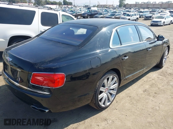 2015 Bentley Flying Spur V8 with VIN SCBET9ZA3FC042007, listed as a IAAI auction lot 40551620 with 27,039 mi miles and . Bid and sale history available at DreamBid. Image 4.