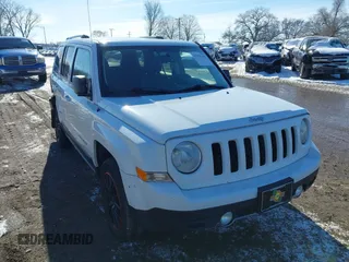 2014 Jeep Patriot Limited with VIN 1C4NJRCB5ED634120, listed as a IAAI auction lot 41394366 with 139,859 mi miles. Bid and sale history available at carsss.com. Image 1.